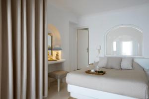Letto o letti in una camera di Andromeda Villas & Spa Resort
