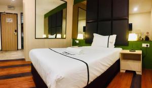Postel nebo postele na pokoji v ubytování Seeds Hotel Ampang Point
