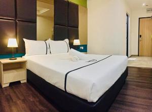 Postel nebo postele na pokoji v ubytování Seeds Hotel Ampang Point