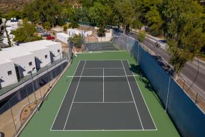 an overhead view of a tennis court at LaLiBay Resort & Spa - Adults Only in Perdika