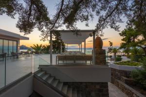a house with a view of the ocean at LaLiBay Resort & Spa - Adults Only in Perdika
