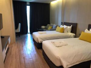 Postel nebo postele na pokoji v ubytování De VeraNiO Resort