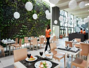 
A restaurant or other place to eat at ONOMO Hotel Libreville
