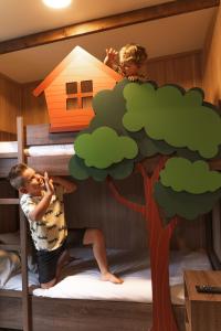 Ein Bett oder Betten in einem Zimmer der Unterkunft Magic Robin Hood