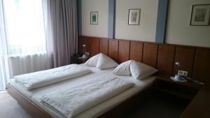Voodi või voodid majutusasutuse Appartements Koffler toas
