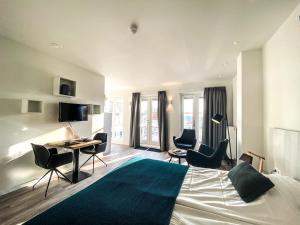TV a/nebo společenská místnost v ubytování Appartement Centrum Domburg DO06