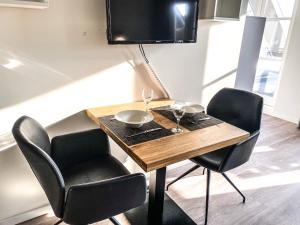 TV a/nebo společenská místnost v ubytování Appartement Centrum Domburg DO06