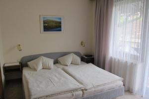 Voodi või voodid majutusasutuse Appartements Koffler toas