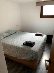Postel nebo postele na pokoji v ubytování Apartaments L'Arc