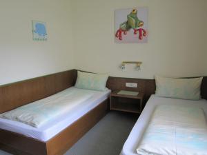 Postel nebo postele na pokoji v ubytování Appartements Koffler