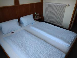 Voodi või voodid majutusasutuse Appartements Koffler toas