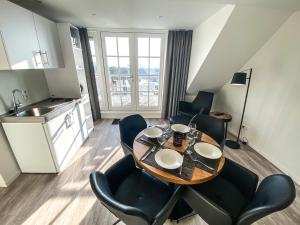 Kuchyň nebo kuchyňský kout v ubytování Prachtig Appartement dichtbij strand DO07