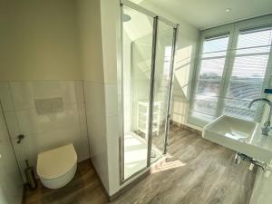 Koupelna v ubytování Prachtig Appartement dichtbij strand DO07