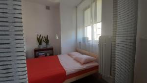 Posteľ alebo postele v izbe v ubytovaní Lovely Jubbly Apartment