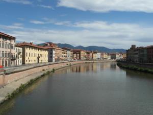 a view of a river in a city with buildings at Bed and breakfast Casa Formica in Cascina