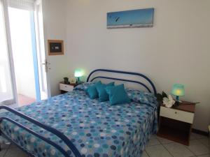 Ένα ή περισσότερα κρεβάτια σε δωμάτιο στο Condominio ZENITH