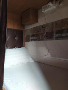 Postel nebo postele na pokoji v ubytování Super Dormitory AC DELUXE