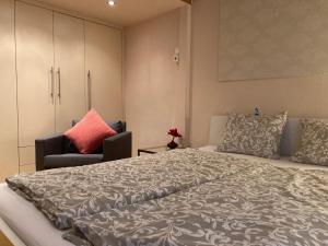 Ein Bett oder Betten in einem Zimmer der Unterkunft Ophelia Apartment