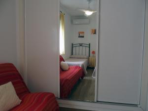 Postel nebo postele na pokoji v ubytování ayapart