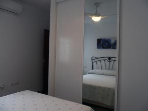 Postel nebo postele na pokoji v ubytování ayapart