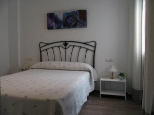 Postel nebo postele na pokoji v ubytování ayapart