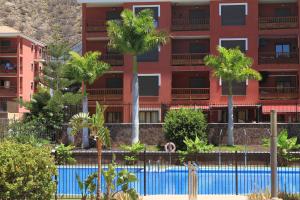 Πισίνα στο ή κοντά στο Spacious apartment with large private garden in Palm Mar