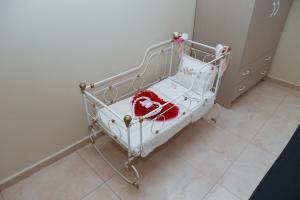 Posteľ alebo postele v izbe v ubytovaní Chrysiida Apartment