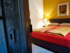 Postel nebo postele na pokoji v ubytování Gästehaus Doris