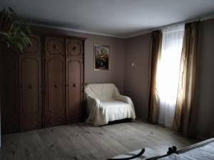 Postel nebo postele na pokoji v ubytování Mözsi Apartman Tolna