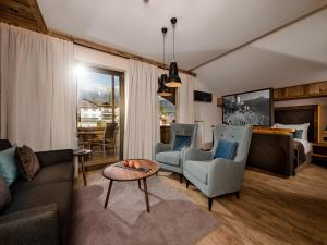 Posezení v ubytování MONDI Hotel Tscherms