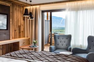 Posezení v ubytování MONDI Hotel Tscherms