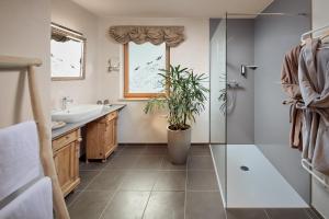 Koupelna v ubytování Hotel Central - das kleine Boutique Hotel am Achensee