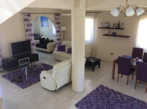 A seating area at Quality Workation Villa with Pool in Superb Location in Paphos