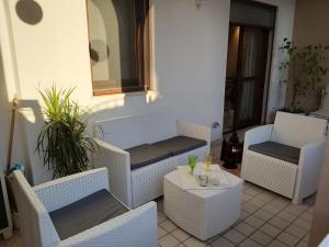 A seating area at Sophia' s house appartamento Quartello