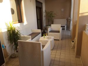 A seating area at Sophia' s house appartamento Quartello