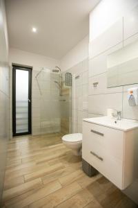 Koupelna v ubytování Apartamenty PIER