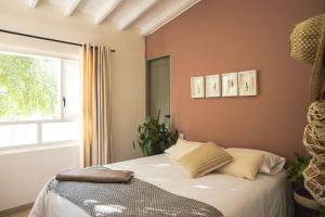 Postel nebo postele na pokoji v ubytování Hotel Quinta Ladera
