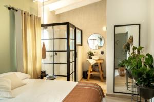 Postel nebo postele na pokoji v ubytování Hotel Quinta Ladera