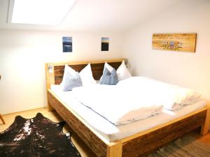Ένα ή περισσότερα κρεβάτια σε δωμάτιο στο Adlerhof