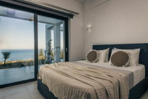 Posteľ alebo postele v izbe v ubytovaní Horizon luxury villa