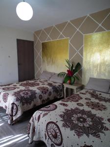 Postel nebo postele na pokoji v ubytování posada yaxche