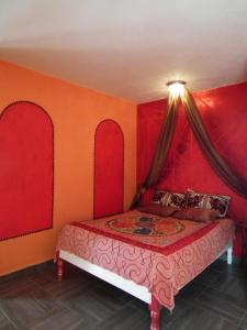 Postel nebo postele na pokoji v ubytování posada yaxche