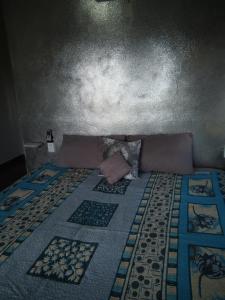 Postel nebo postele na pokoji v ubytování posada yaxche