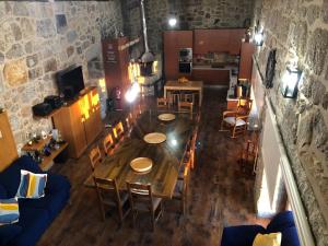 an overhead view of a dining room with a table and chairs at Quinta do Ovelheiro in Guimarães
