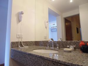 Koupelna v ubytování Catamarca Suites Land + 29 fotografií
