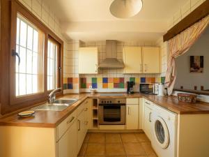 A kitchen or kitchenette at Apartment in Palomares near the Beach