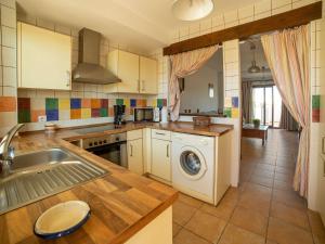 A kitchen or kitchenette at Apartment in Palomares near the Beach
