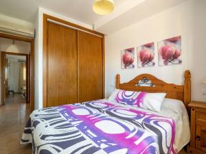 A bed or beds in a room at Apartment in Palomares near the Beach