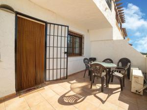 A balcony or terrace at Apartment in Palomares near the Beach