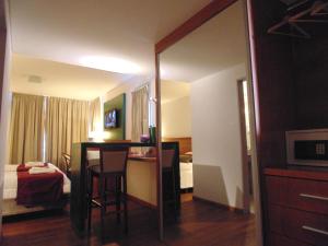 TV a/nebo společenská místnost v ubytování Catamarca Suites Land